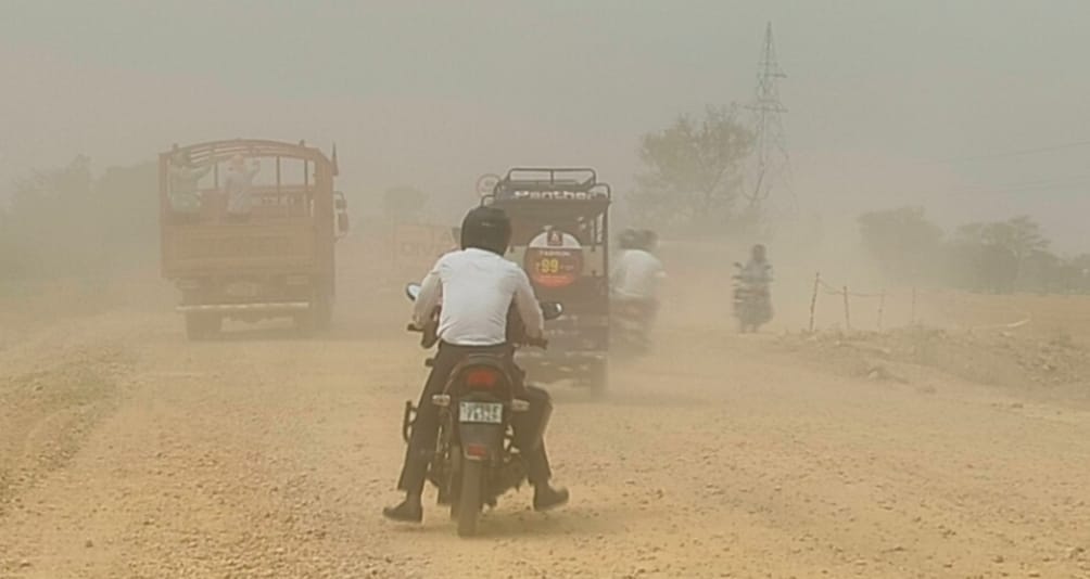 Dust storm on the under-construction road...health deteriorating