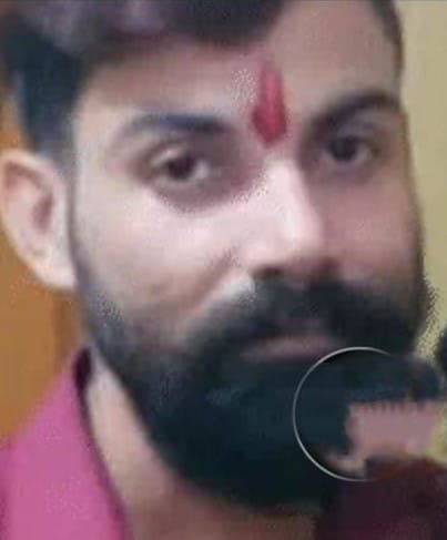 A masked husband slits his wife's throat and then pours acid mixed with gulal on her lover.
