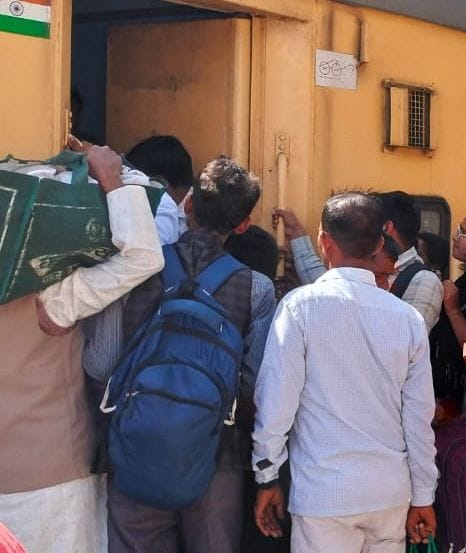 Crowds of people returning after Holi