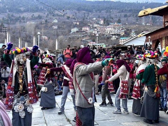 People dressed in traditional attire celebrate Raulane festival in Kalpa