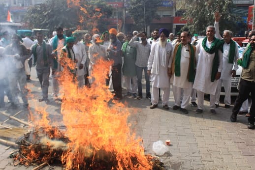 Farmers protest against trade deal, tractor march, effigy burnt