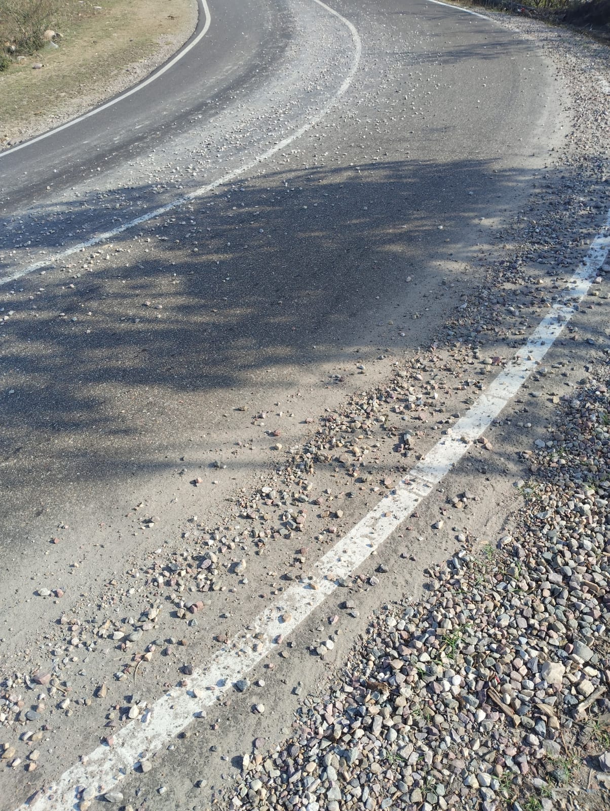 A death trap laid on the roads with sand and gravel