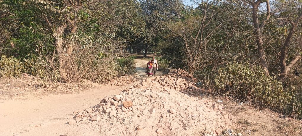 The dilapidated bridge connecting Lai village to the main road