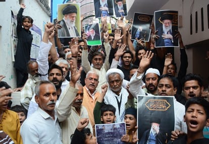 The Shia community took to the streets, protesting against America and Israel.