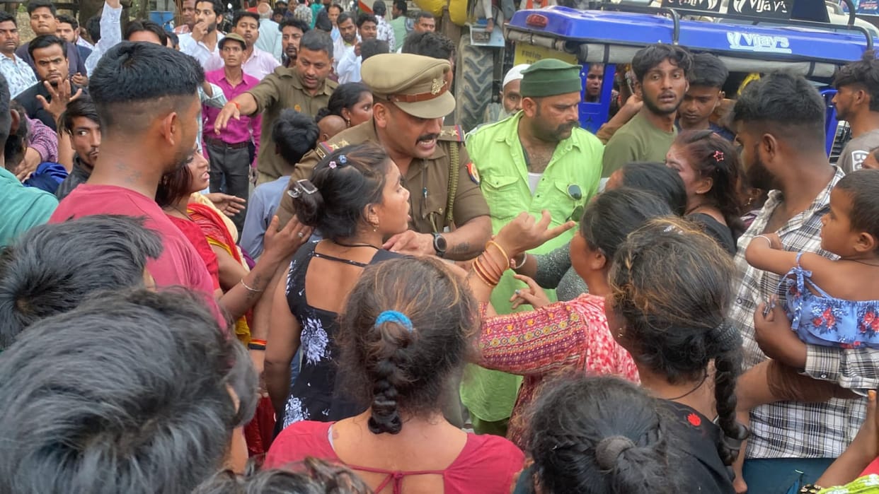 Villagers, dissatisfied with police action in the fight, blocked the road.