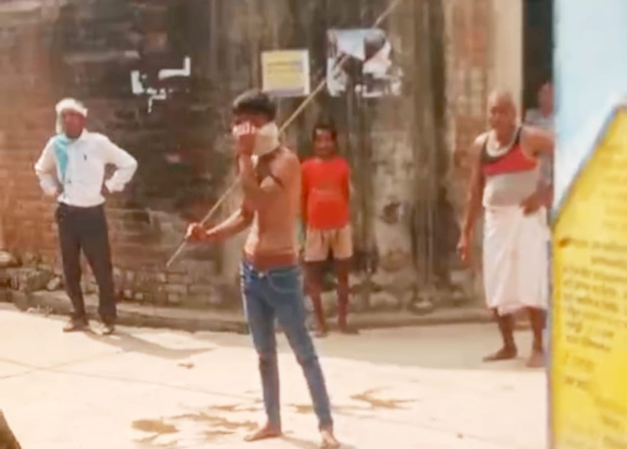 During the bride's entry into the wedding procession, neighbours attacked her with sticks.