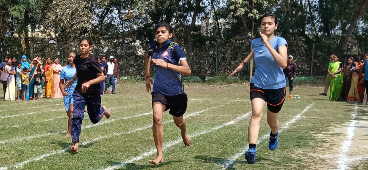 Girls raced to victory, hoisted the flag