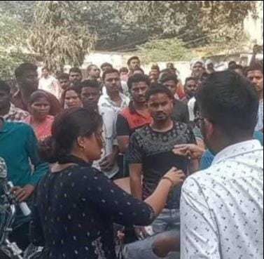 Women clash to sit on the chair outside the X-ray room