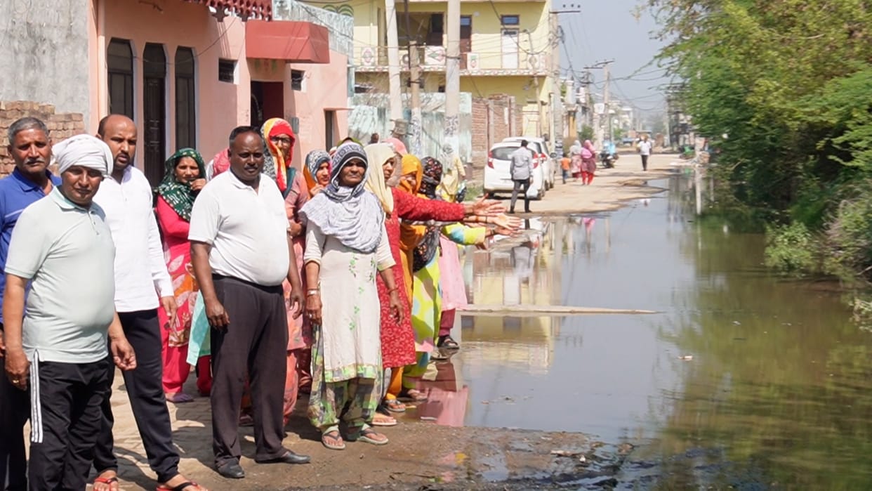 Villagers forced to wade through mud due to lack of drainage