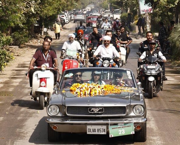 Vintage cars raced through the city streets, drawing crowds.