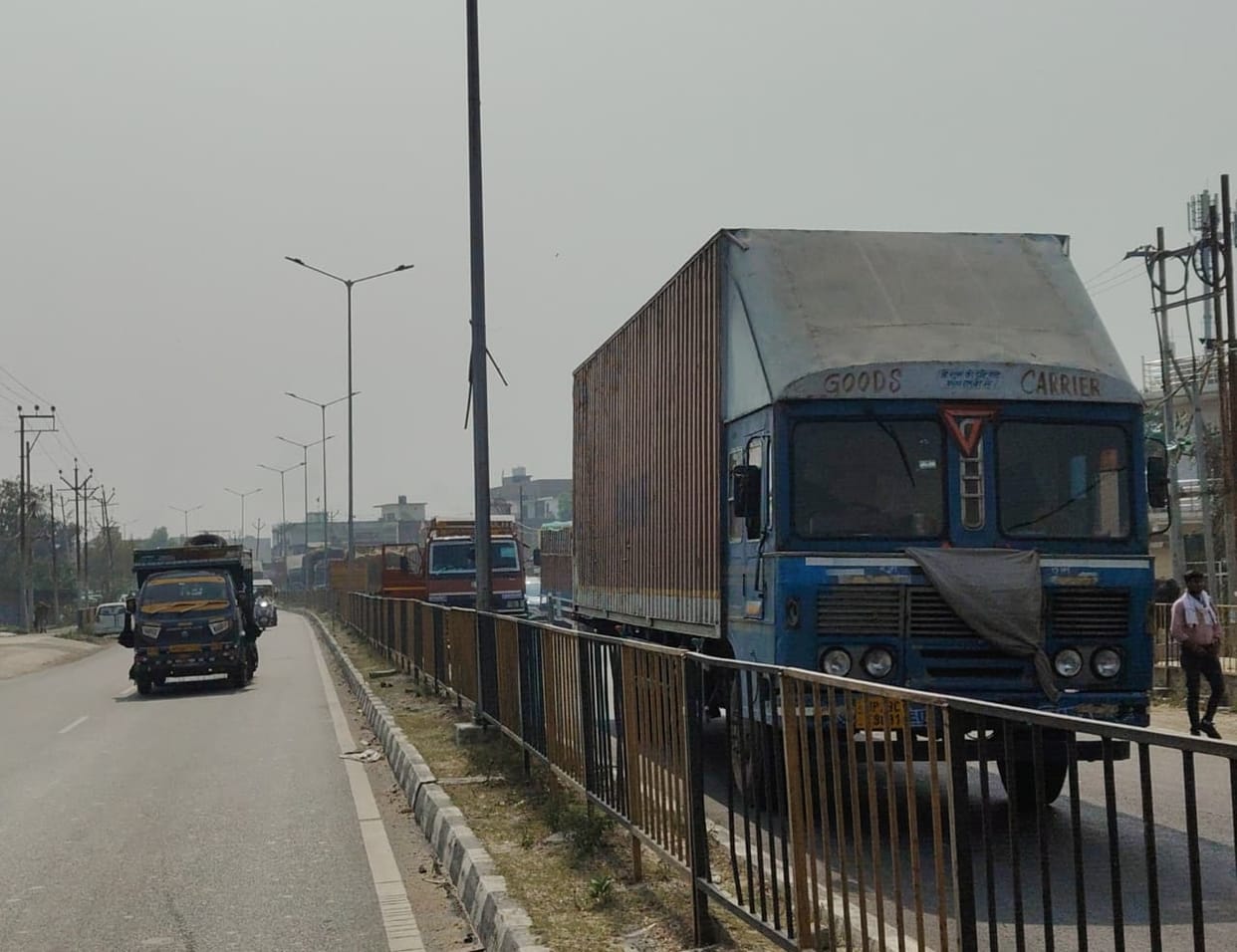 Cement-laden truck stuck on highway