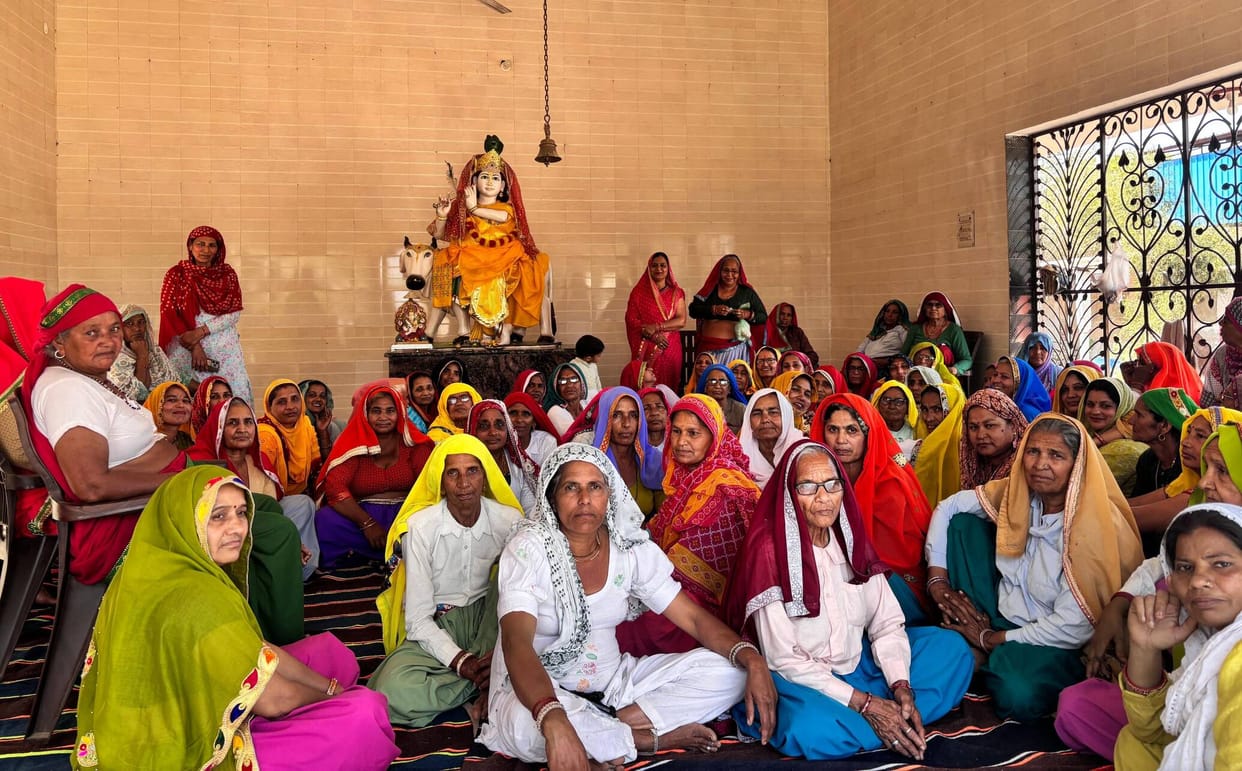 Women's groups sang hymns in the cowshed.