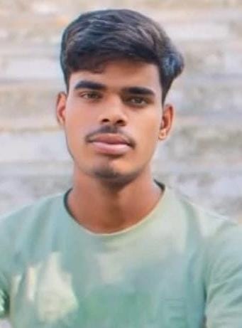 Angry over the death of a youth injured in an accident, his family members blocked the road by placing his body.