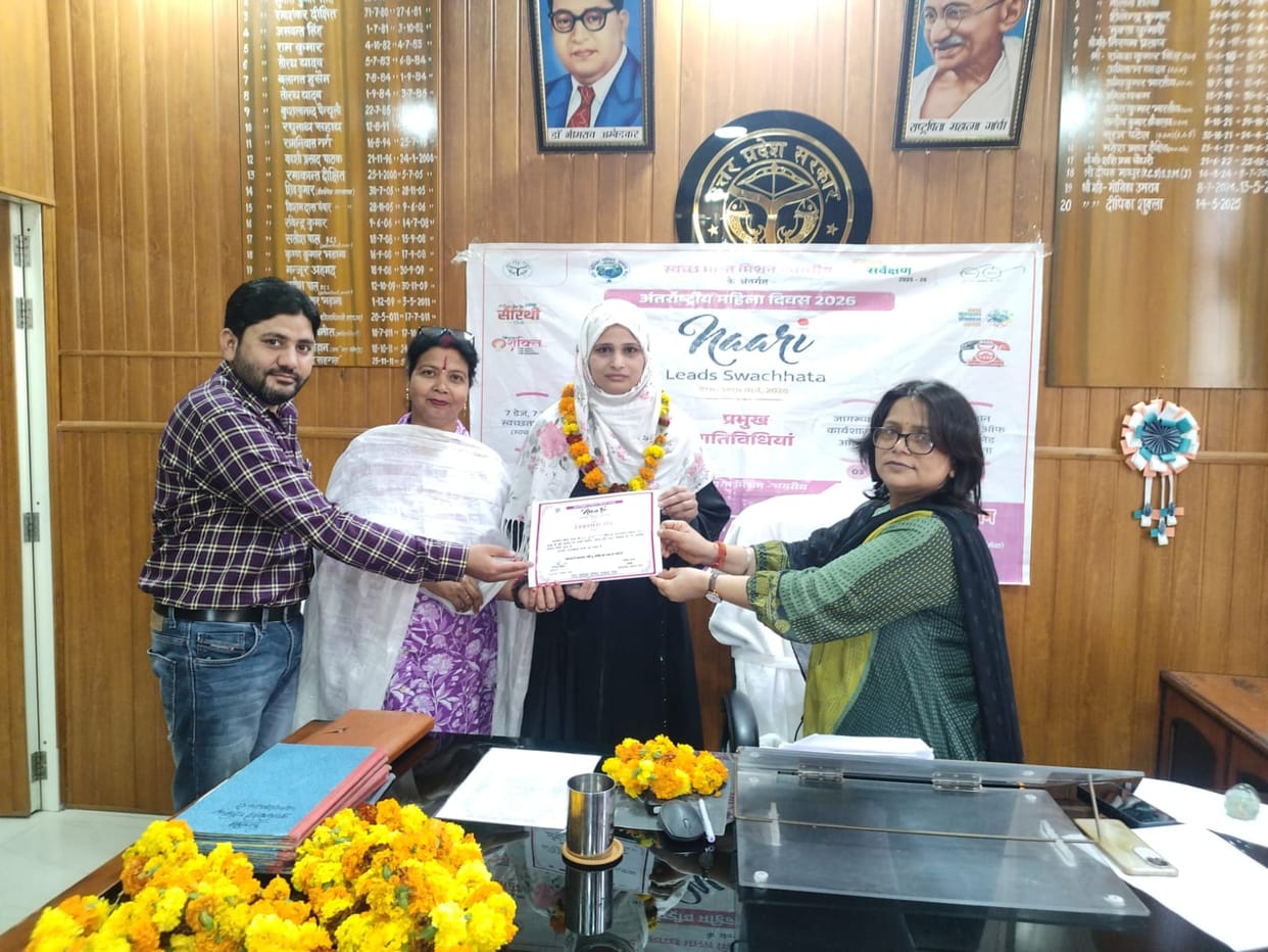 Women's self-help group honored with a certificate