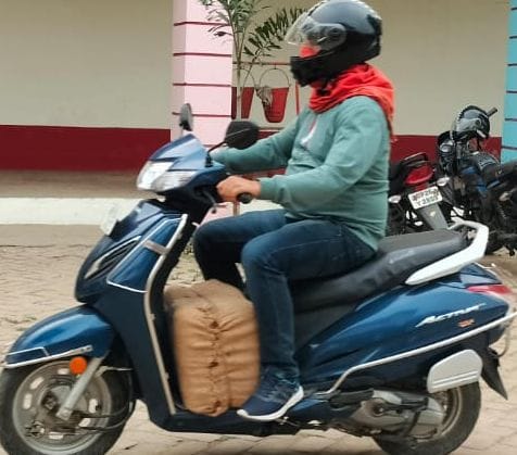 Board exam answer sheets delivered by scooter and bike