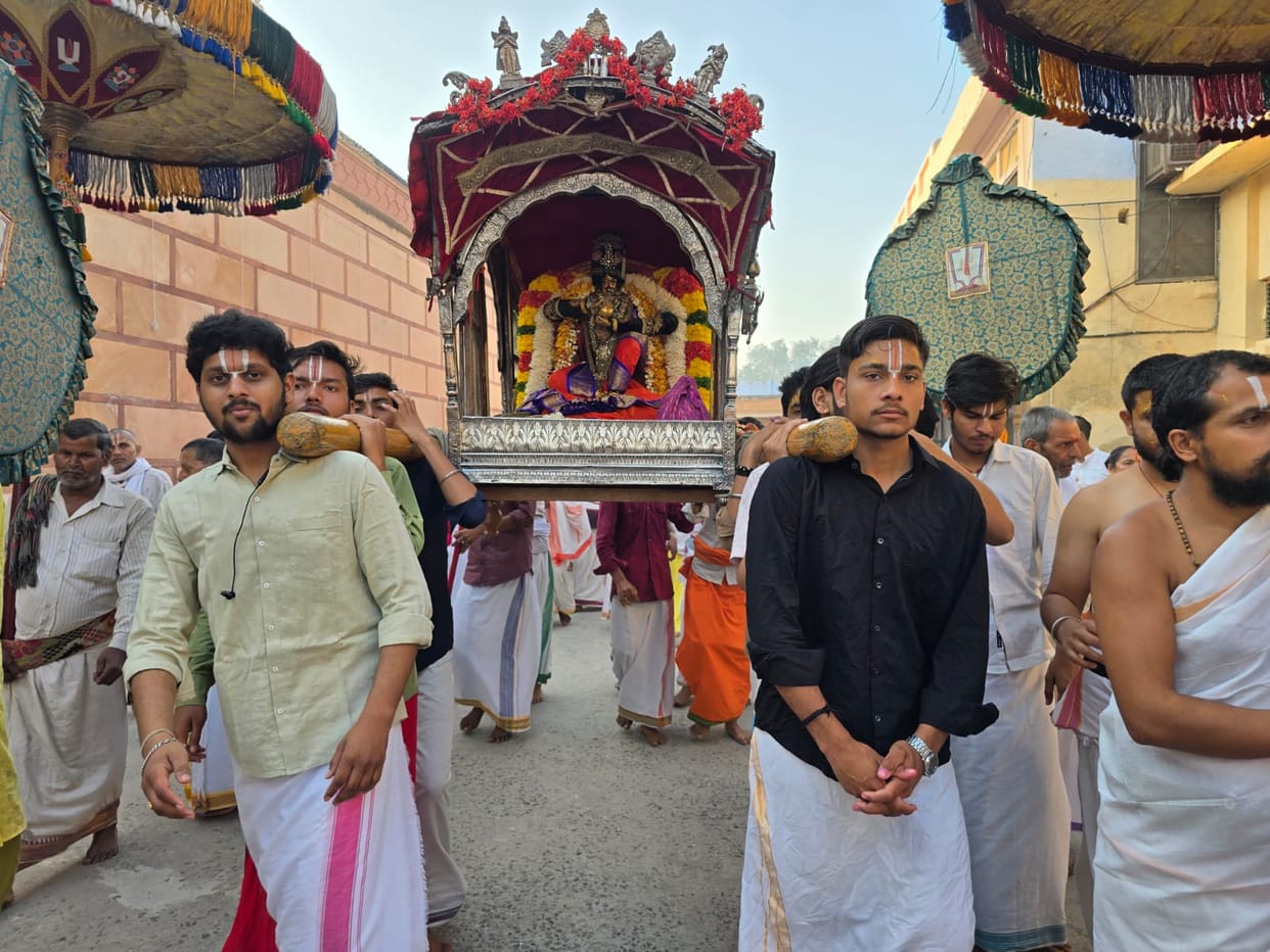 Lord Ranganatha, dressed as Mohini, sits in a silver palanquin.