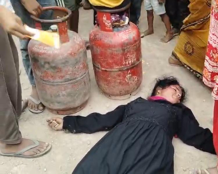 A woman fainted while standing in a queue for a cylinder.