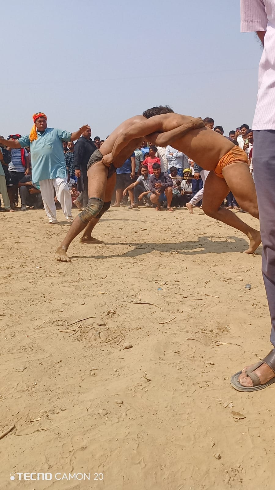 The wrestling arena resonated with enthusiasm, with Saurabh and Naresh's wrestling becoming an attraction.