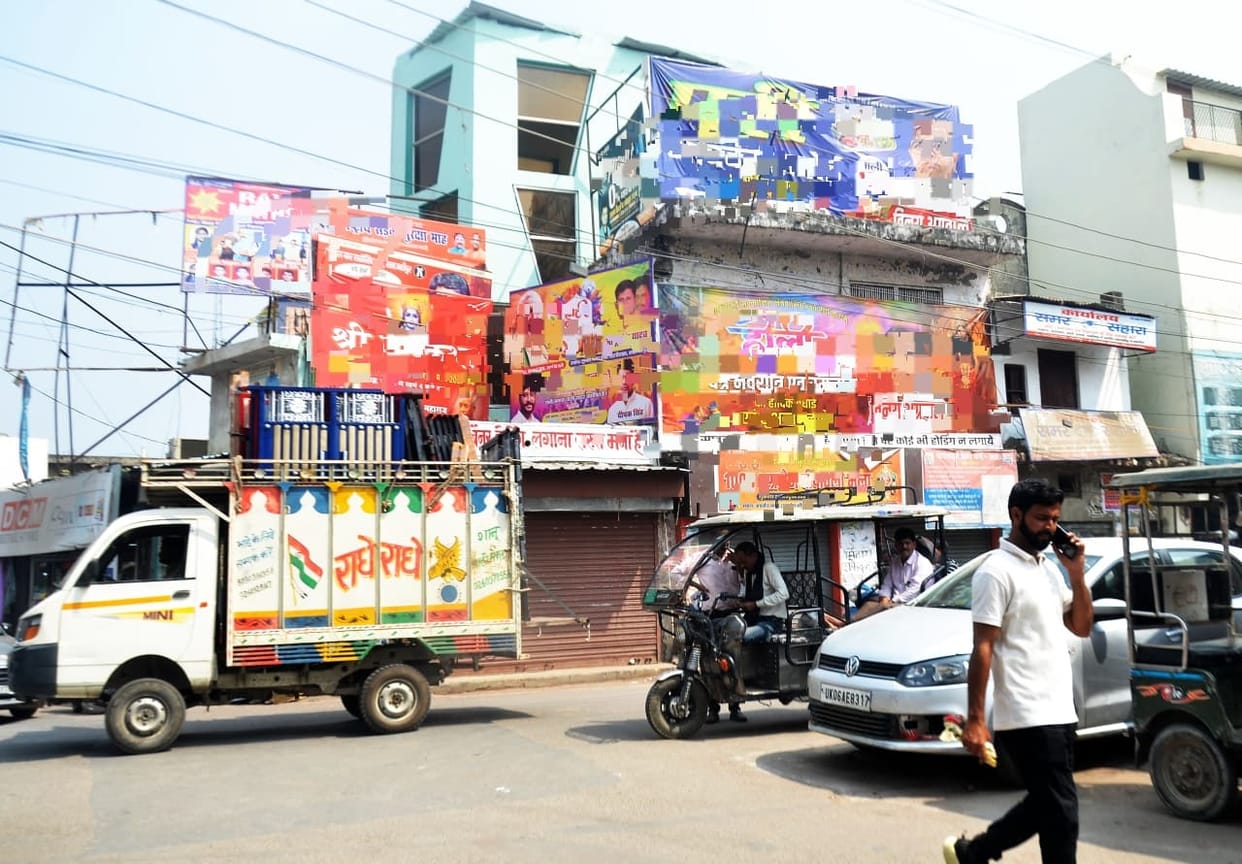 Crossroads filled with illegal hoardings and banners...responsible people unaware