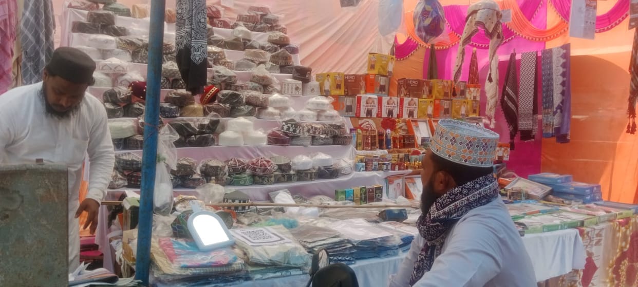 Afghan hats and perfume shops adorn the Eid market