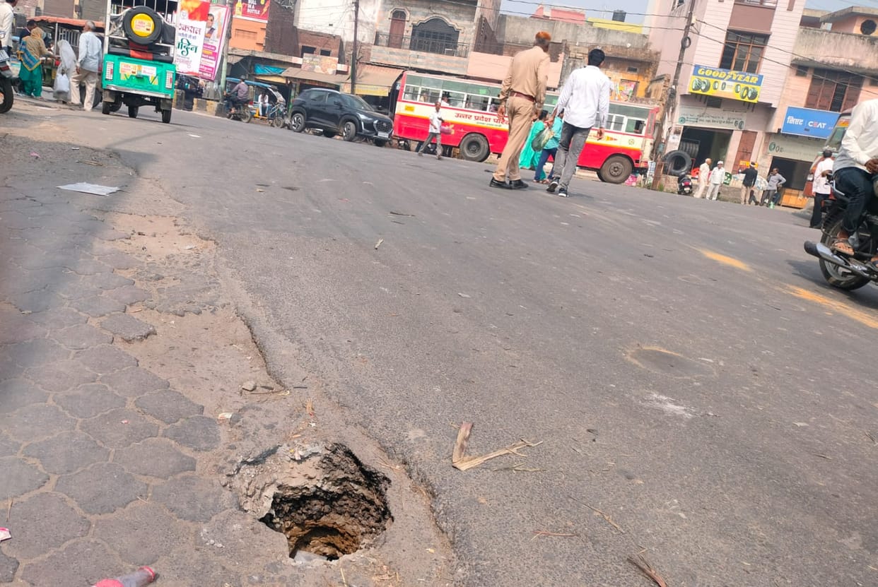 Road caves in at Jansath intersection, creating a deep pit