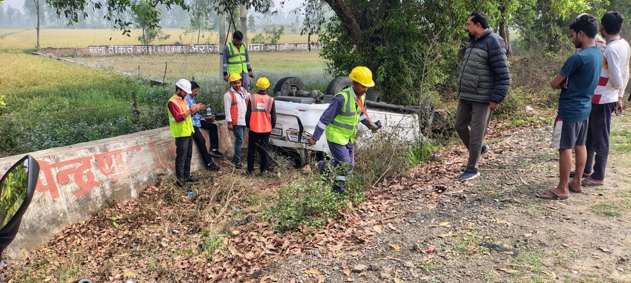 A tyre burst caused the car to hit a tree and overturn into a ditch, with the driver narrowly escaping.