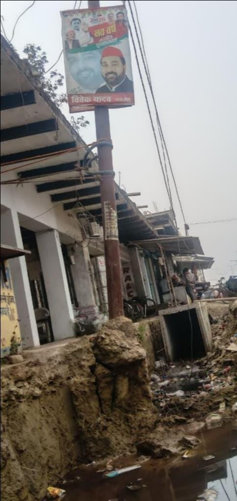 Electricity pole hanging due to drain digging