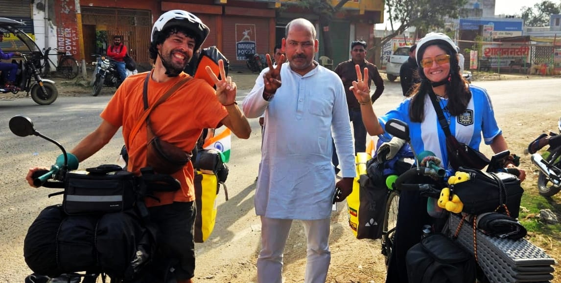 Foreign couple on a bicycle tour of India welcomed