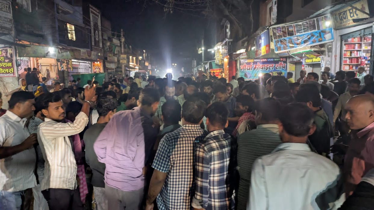 The businessman's son was murdered by slitting his throat and villagers blocked the road by placing his body.