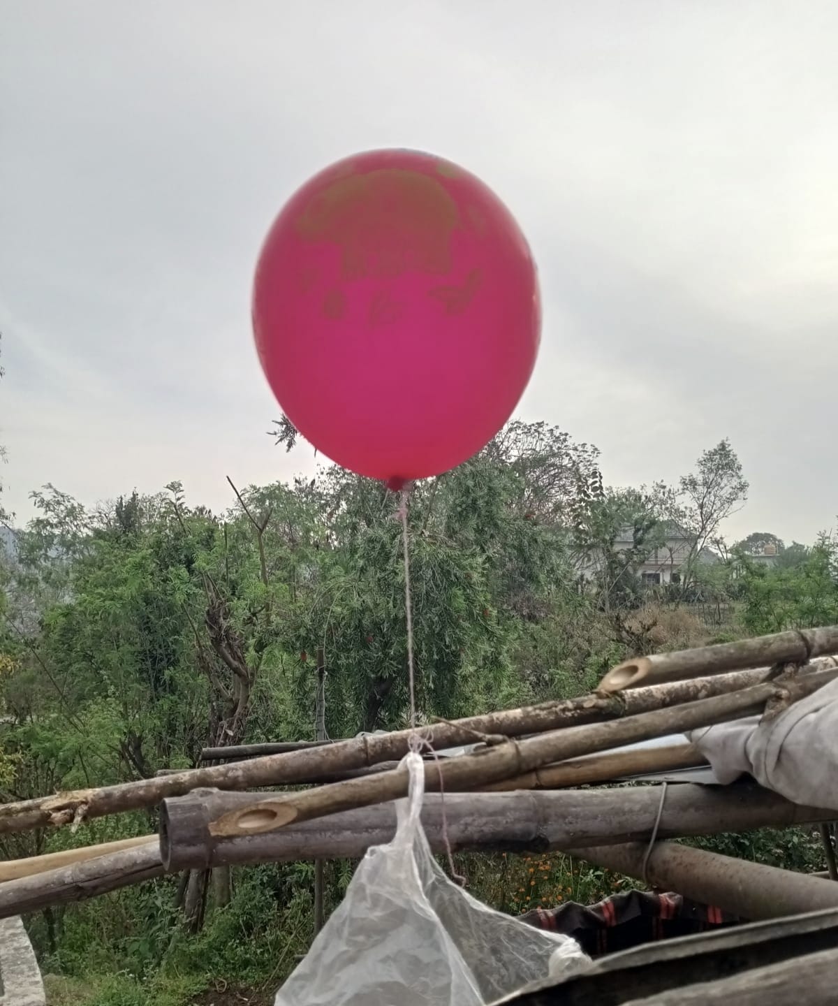 A suspicious balloon was found in Bakain village, and the envelope contained two Pakistani currency notes.