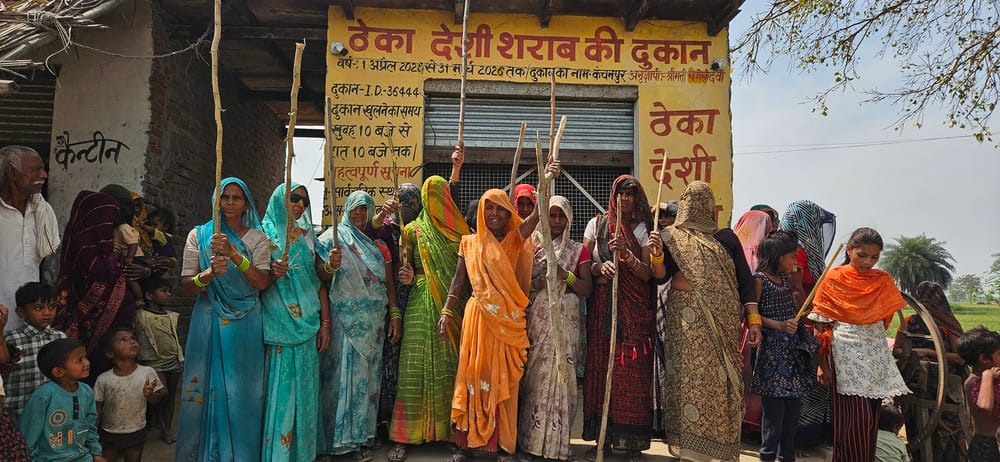 Women armed with sticks and rods arrived to shut down the liquor shop.