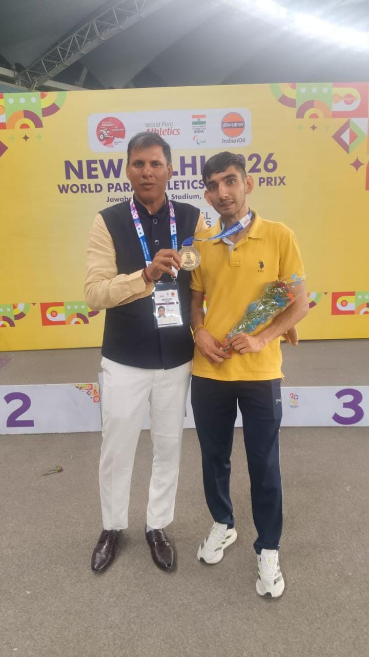 District coach Raman won gold in the National Para Athletics Competition