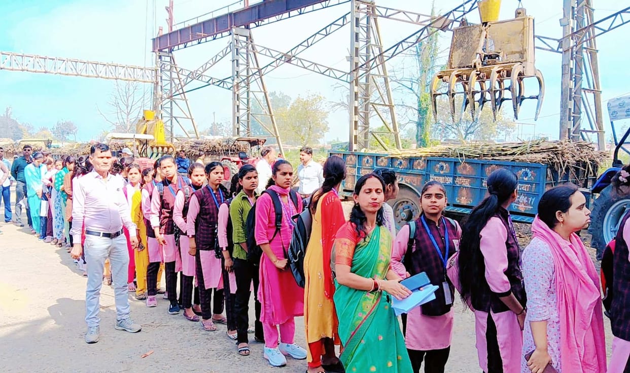 Female students conducted an educational tour of the Farmers' Cooperative Sugar Mill.