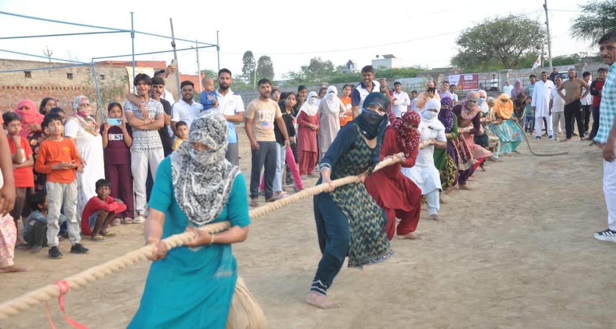 Air Force Wins in Basketball; Sushila Wins in Tug-of-War