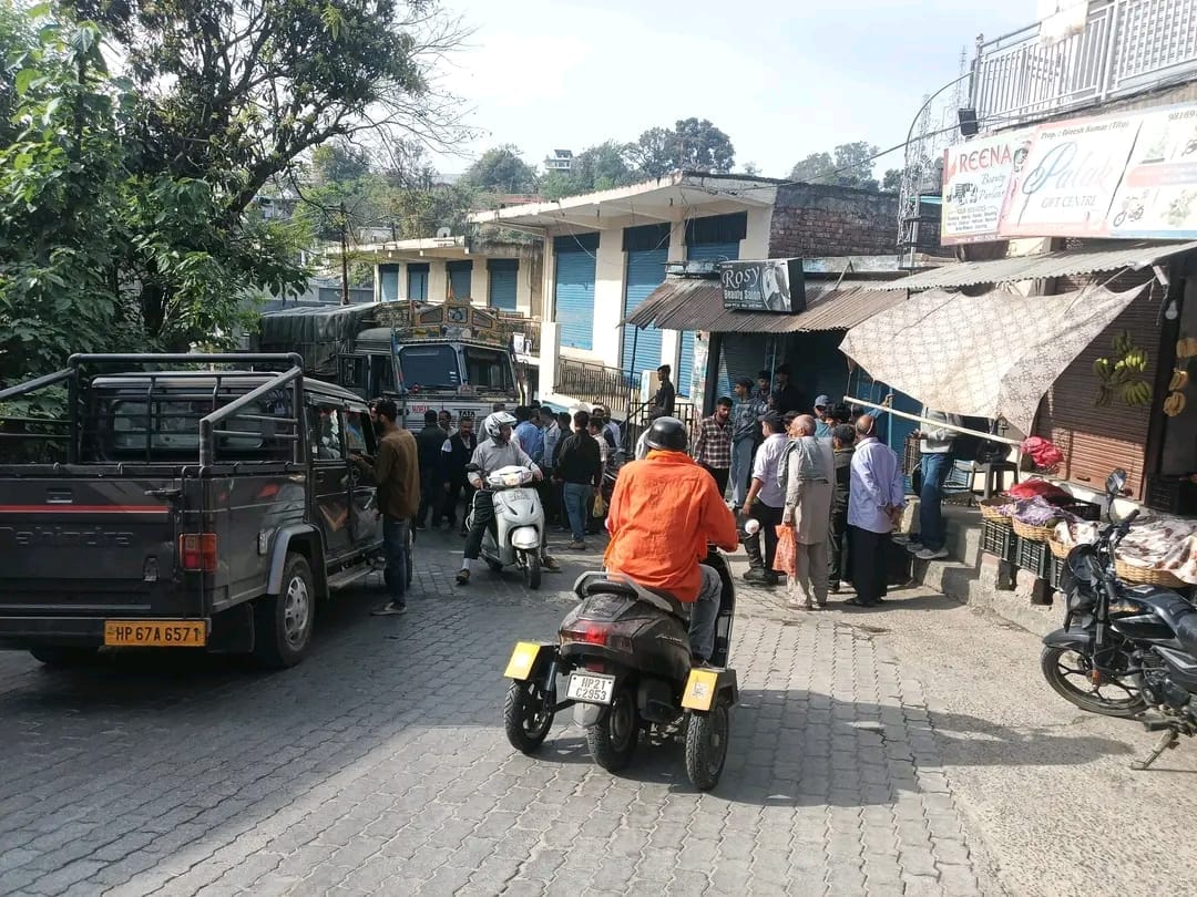 Car and scooter collide at Kuan Chowk