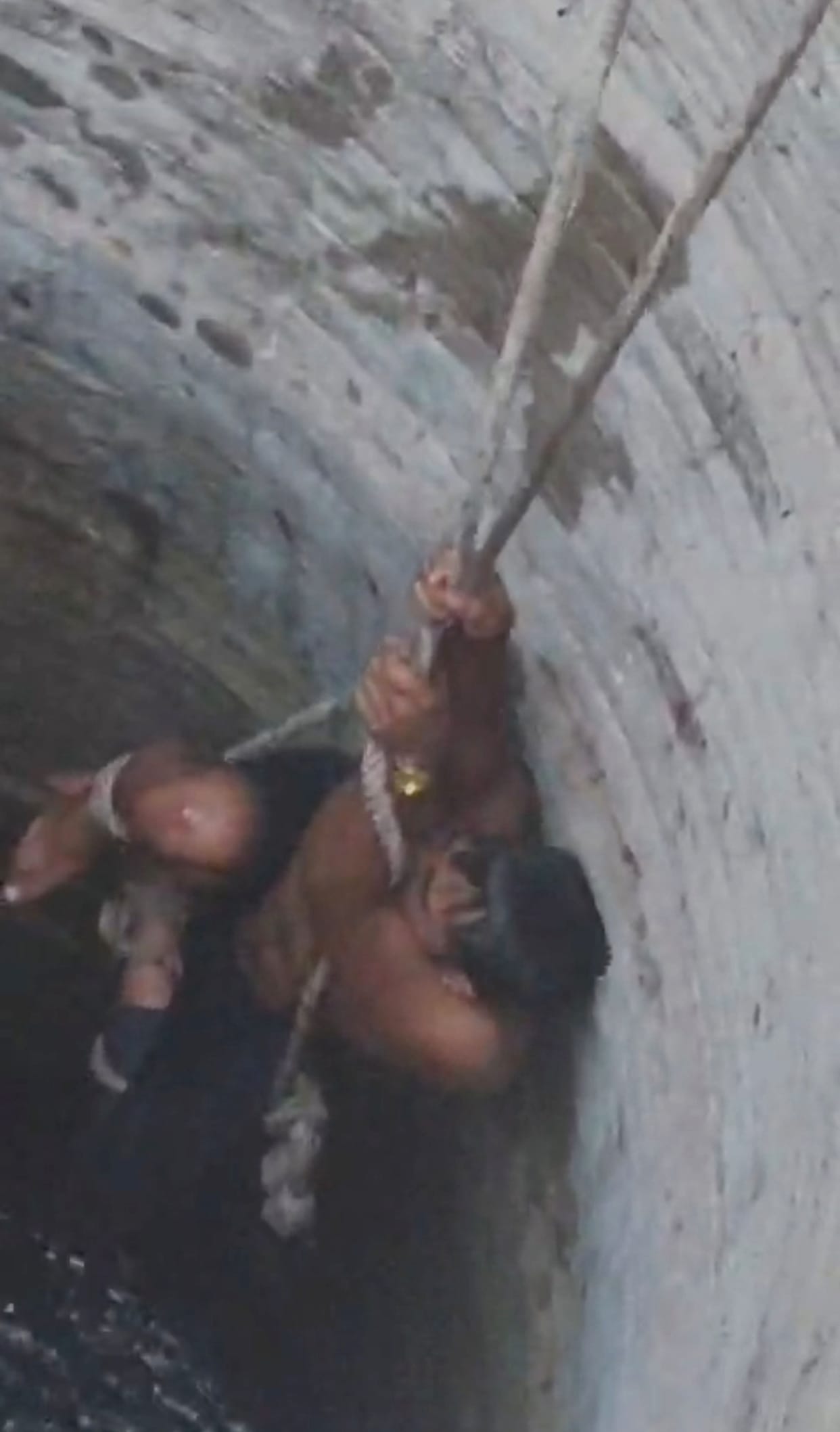 After being held hostage and beaten, the youth was pushed into a well.