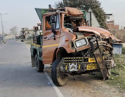 Crane overturns after colliding with two trucks, cleaner killed