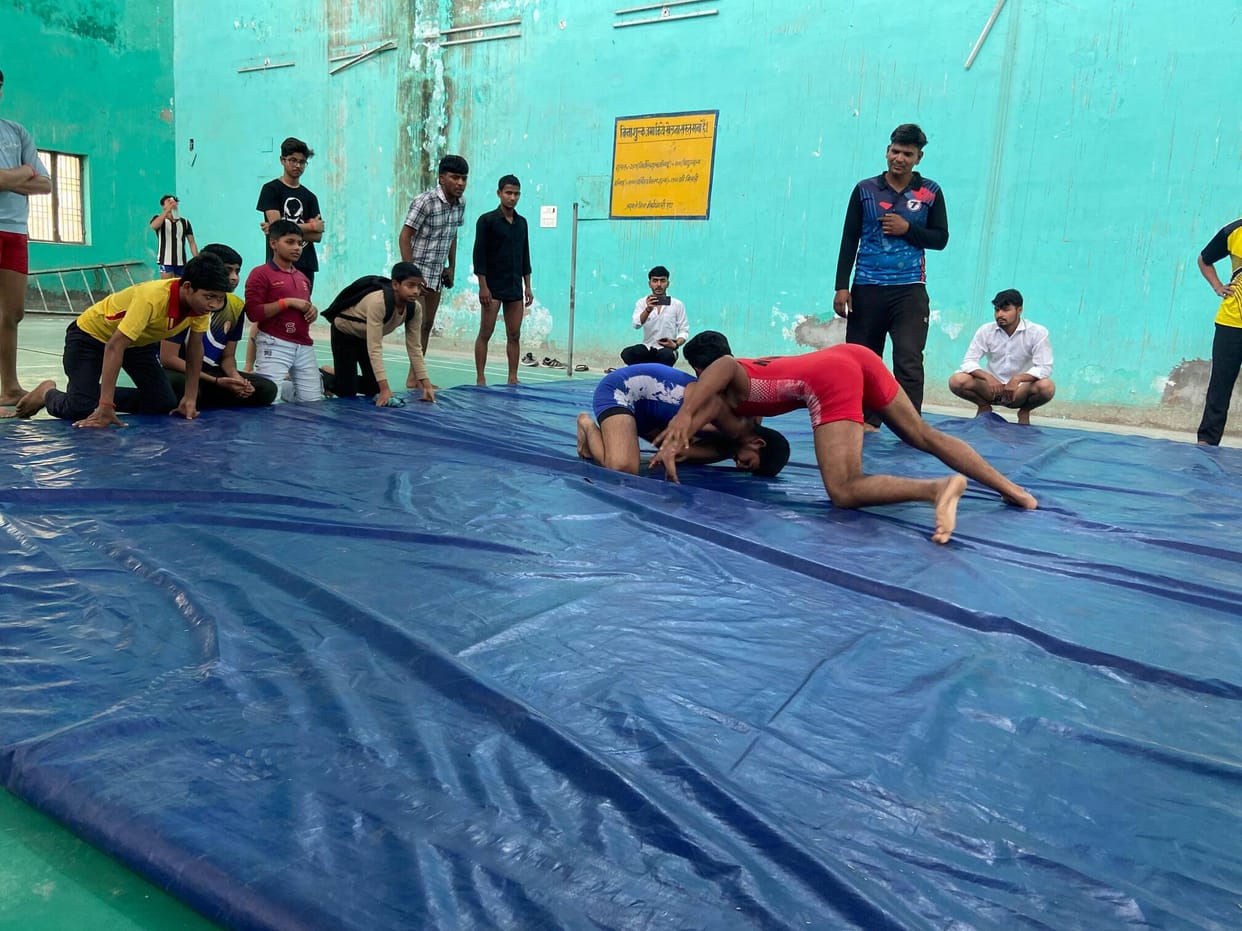 Gungun first in wrestling and Akshay first among boys