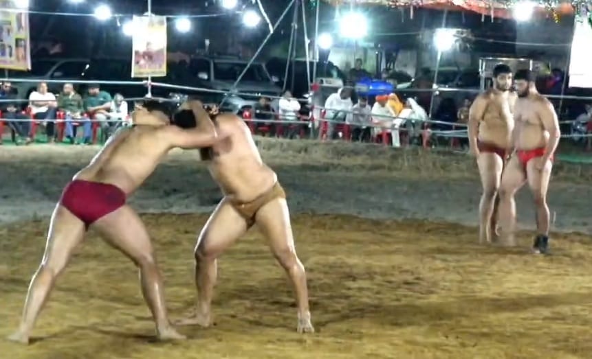 Wrestlers Display Their Moves and Techniques at the Prize Wrestling Tournament on Guru Hanuman's Birth Anniversary