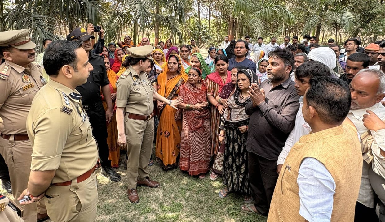 The SP's office was surrounded; villagers claimed two others were involved in the murder, and the police were protecting them.