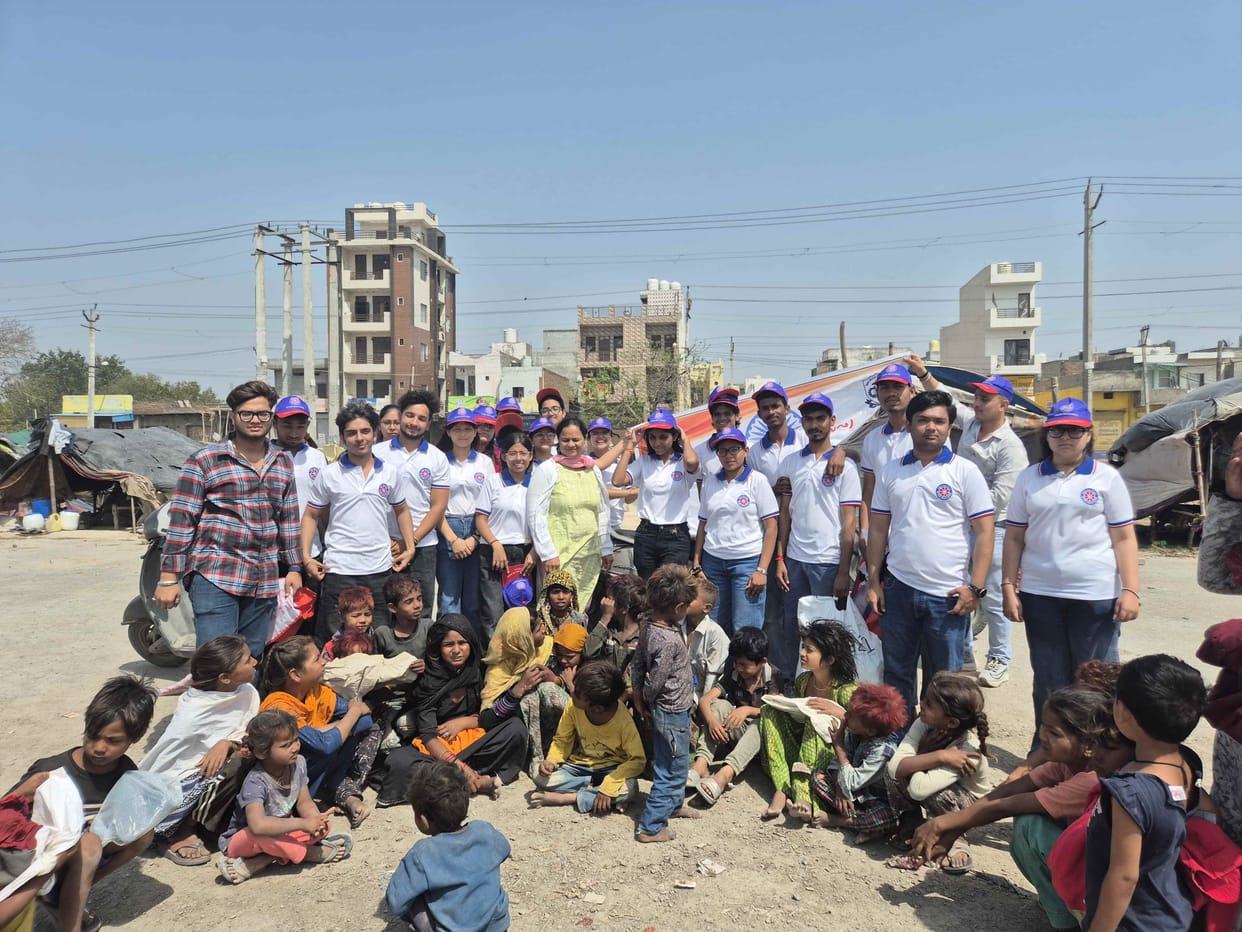Volunteers distributed food and clothes to the needy.