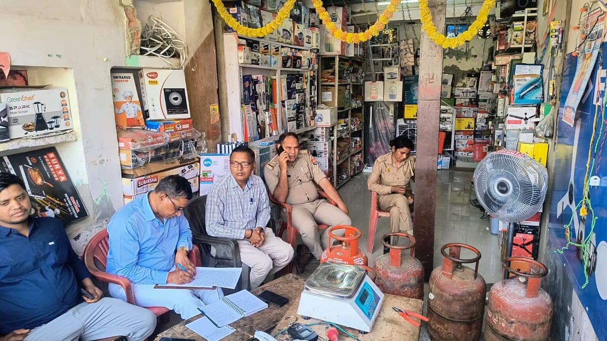 Two teams raided two locations, seized 17 cylinders, and filed an FIR against three people, including a father and son.