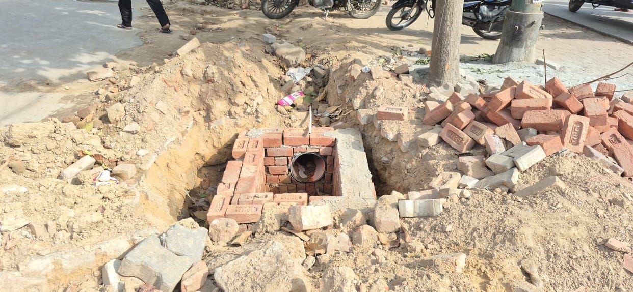 Work on Mall Road slows, with unfinished stormwater channels leaving shopkeepers distressed.