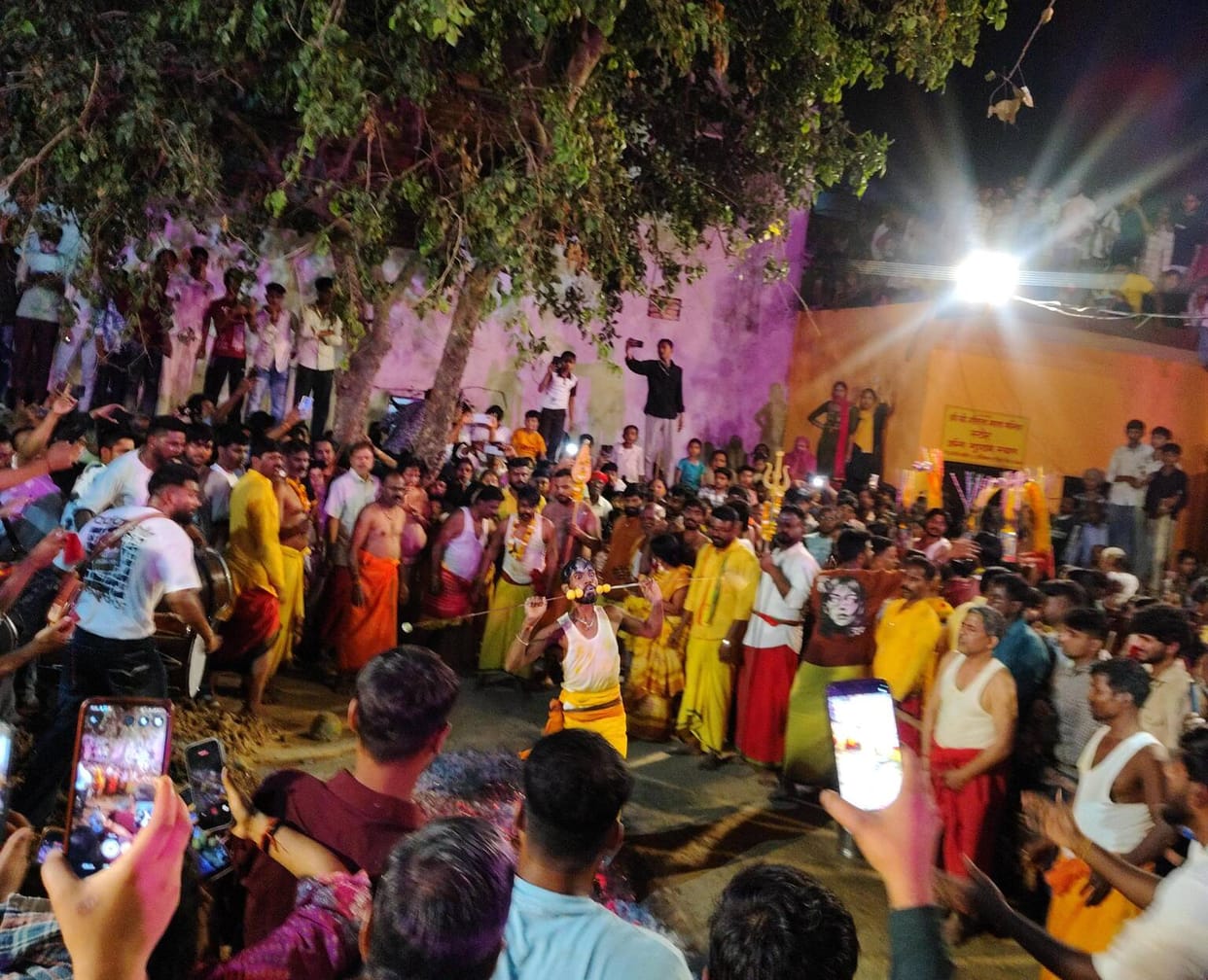 Devotees showed their devotion by walking on embers.
