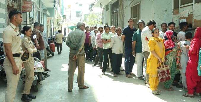 Gas Cylinder Slips Distributed Under Police Guard; Six-Hour Wait Outside Warehouse