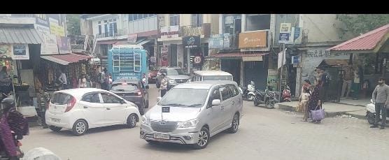 The Bijhari market is jammed, and now even the DC's car is stuck.