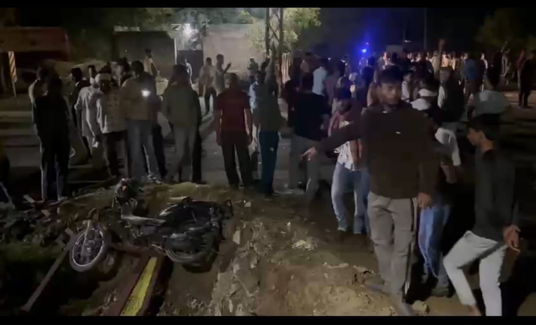 Enraged villagers block highway following road accident.