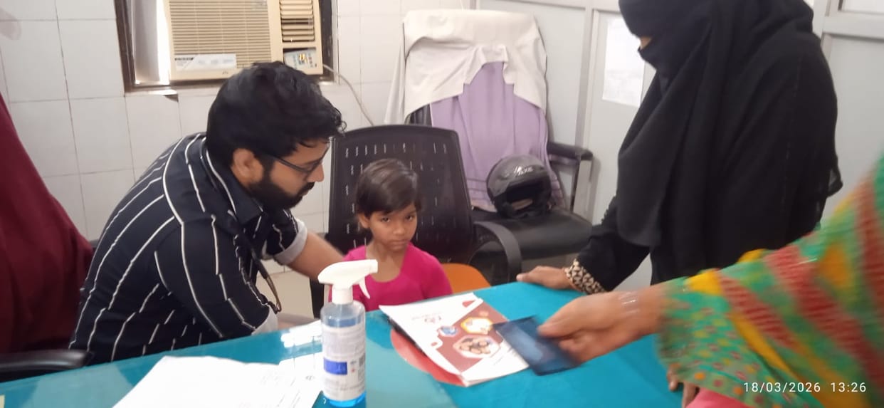 988 patients arrived at the district hospital, 205 were found suffering from fever.
