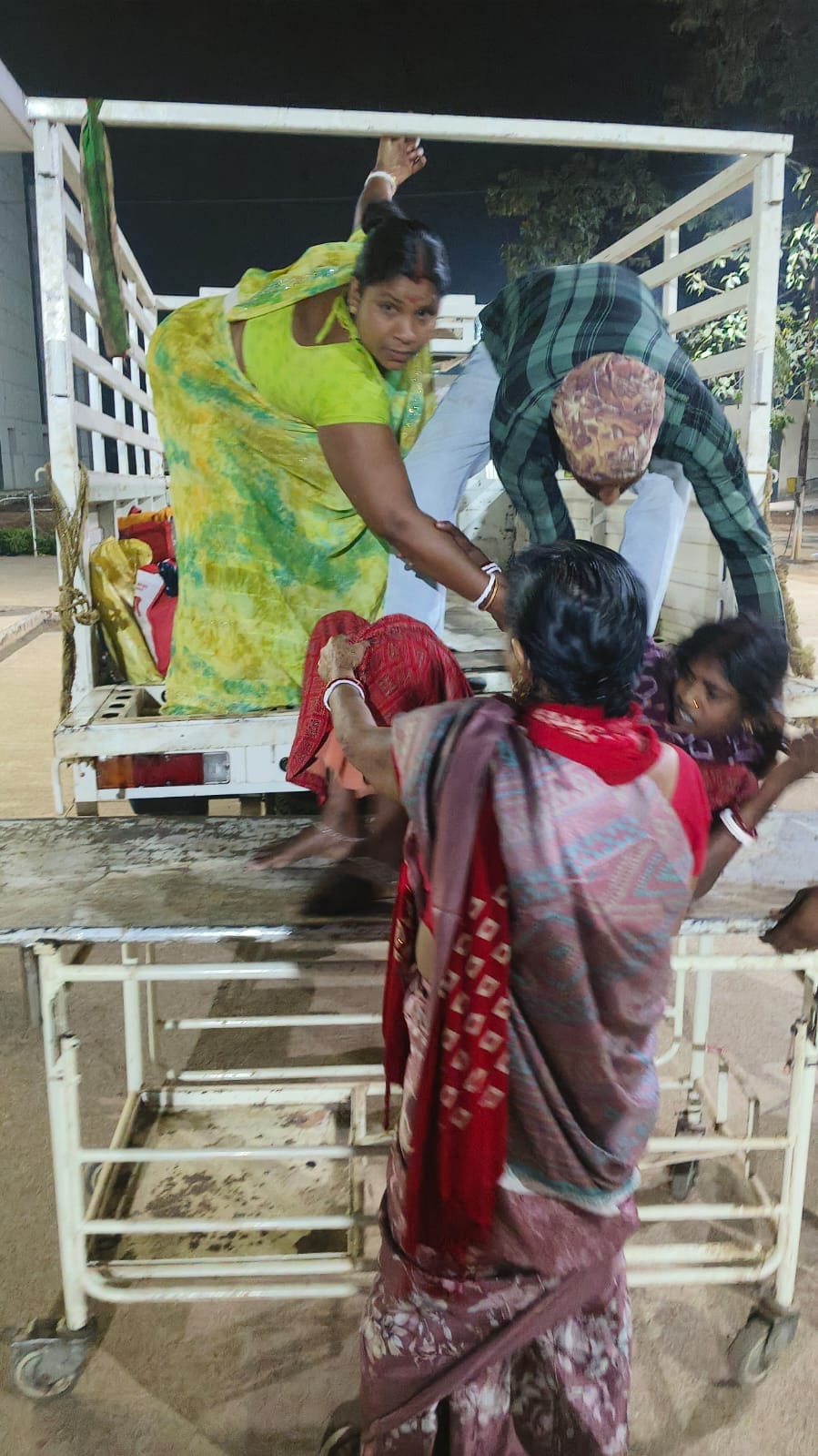 pickup truck supports pregnant woman and takes her to hospital