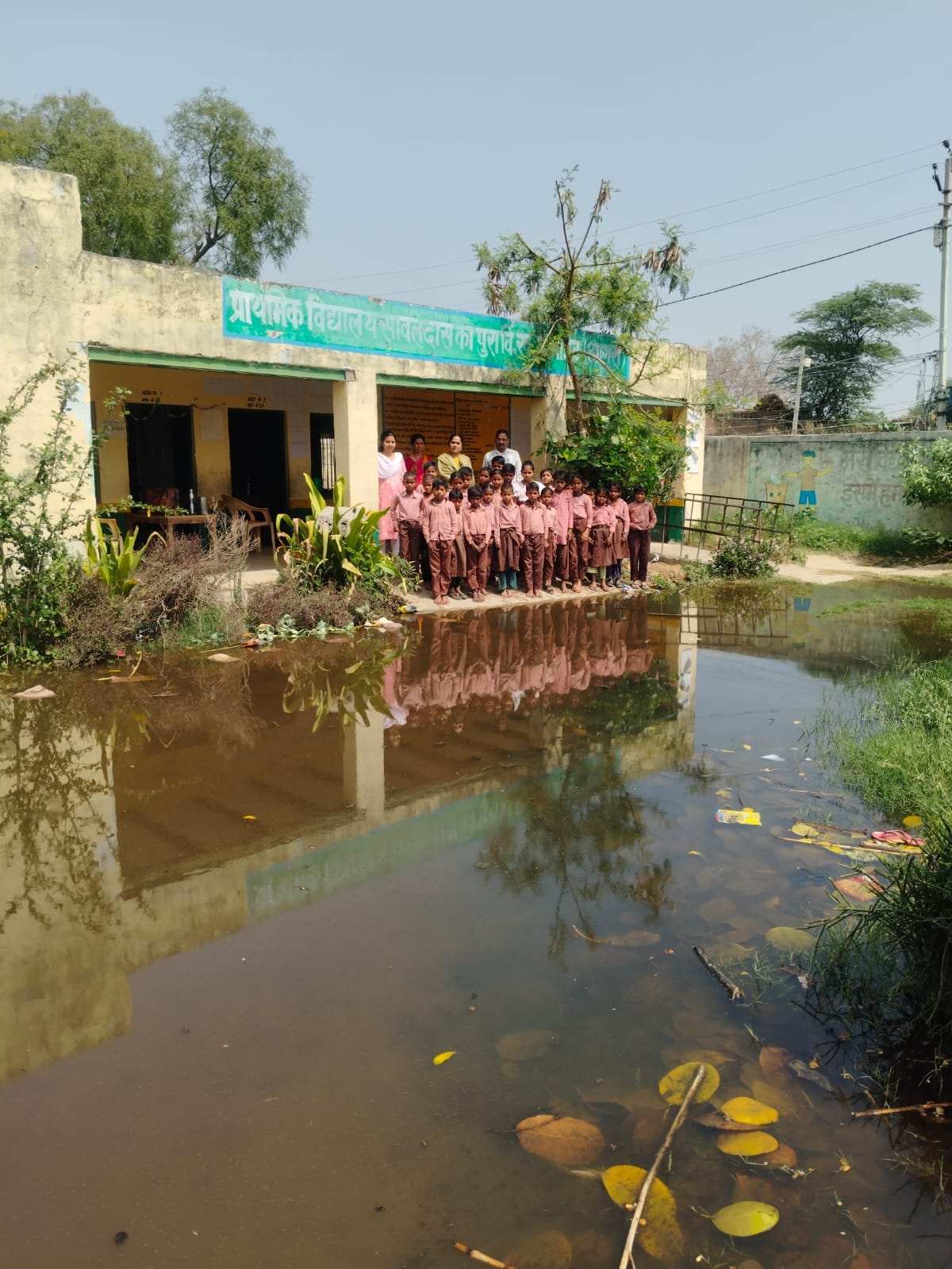 Sewer water blocked the way to school